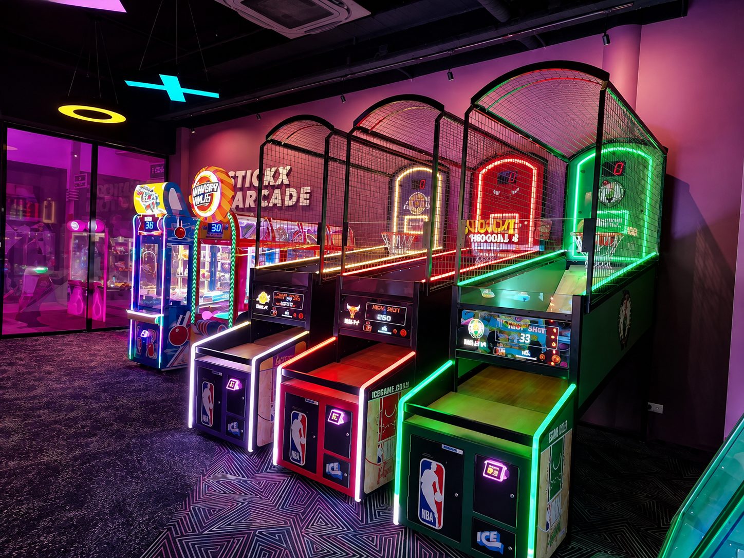 Neon lit arcade machines inside Arcade, Zaandam